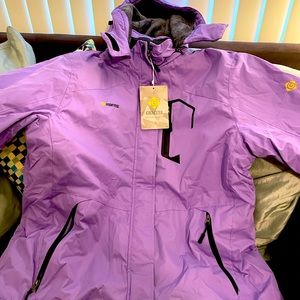 Women's XL Winter waterproof sports/insulated jacket. Brand new with tags.